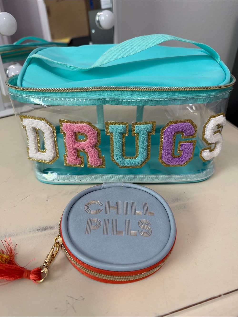 Clear Turquoise Travel Toiletry Bag with Multicolor Lettering